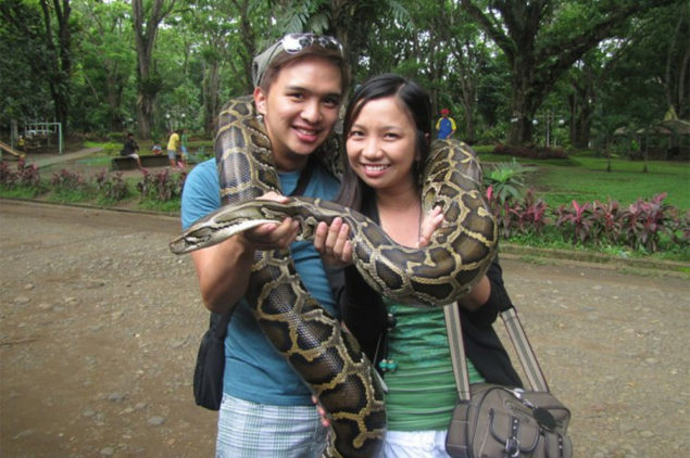 Picture taking with a python at the Philippine Eagle Sanctuary in Davao
