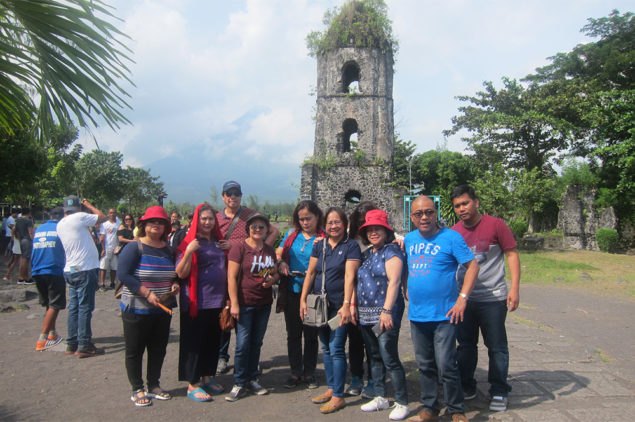 Happy guests of e-Philippines at Cagsawa Ruins, Albay, Bicol