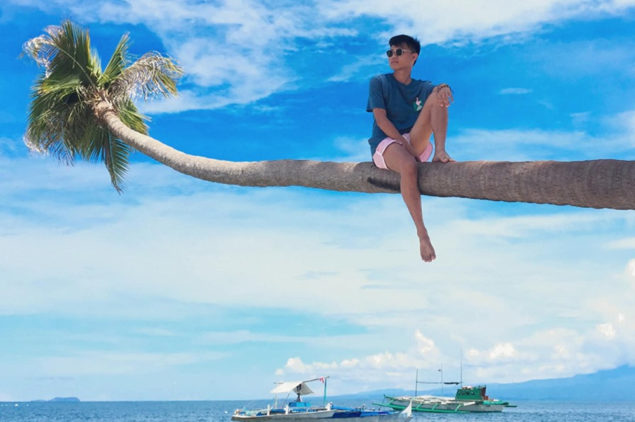 Sit on Coconut Trees in Siquijor Island