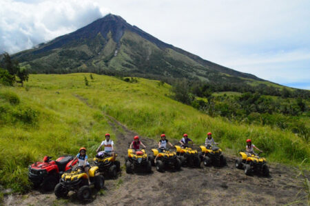 Happy guests of ePhilippines riding the ATV at Mount Mayon, Bicol